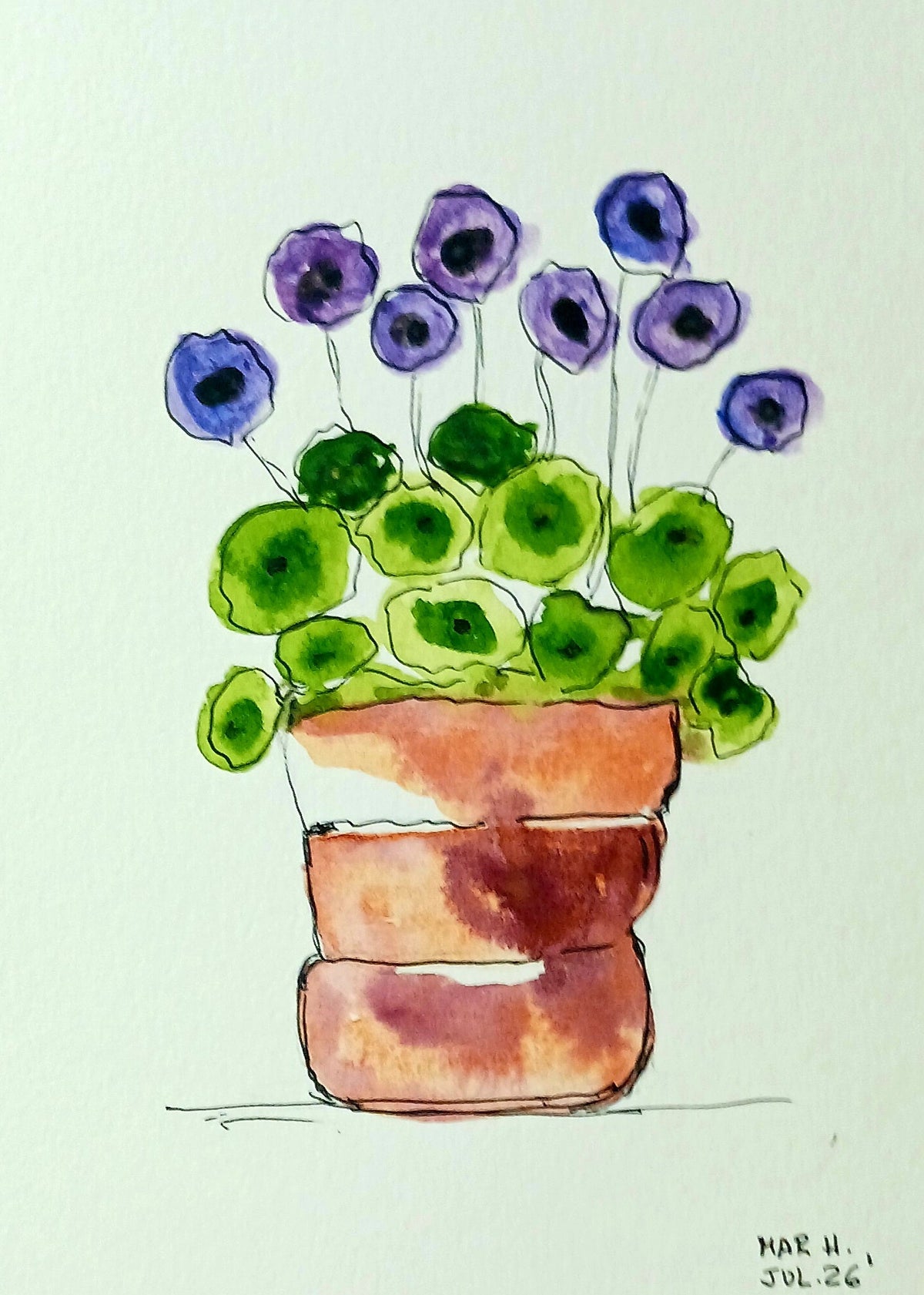 Maceta con flor violeta